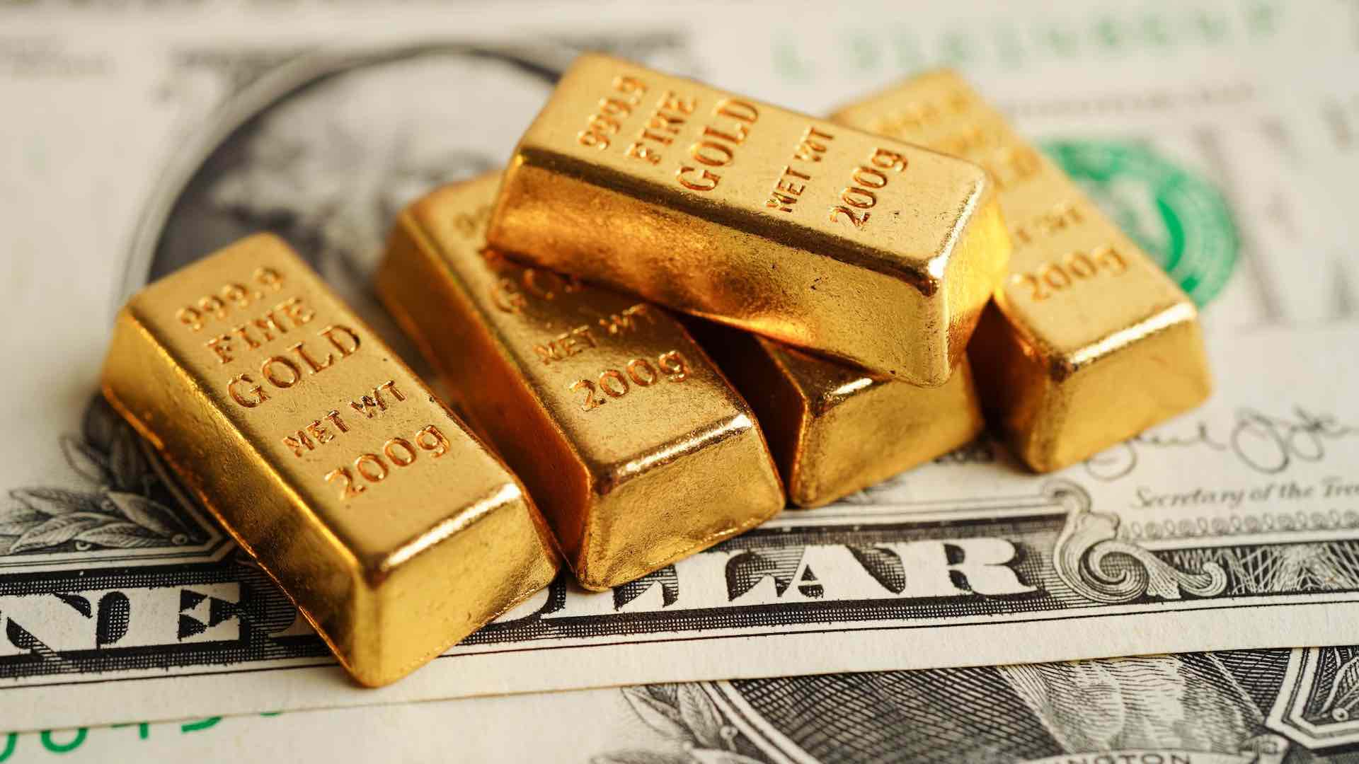 Gold continues upward climb, scaling one-year high racing past $2,000 an ounce